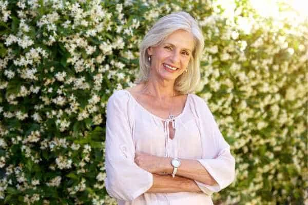 Older woman happy with urinary incontinence treatment Hampshire